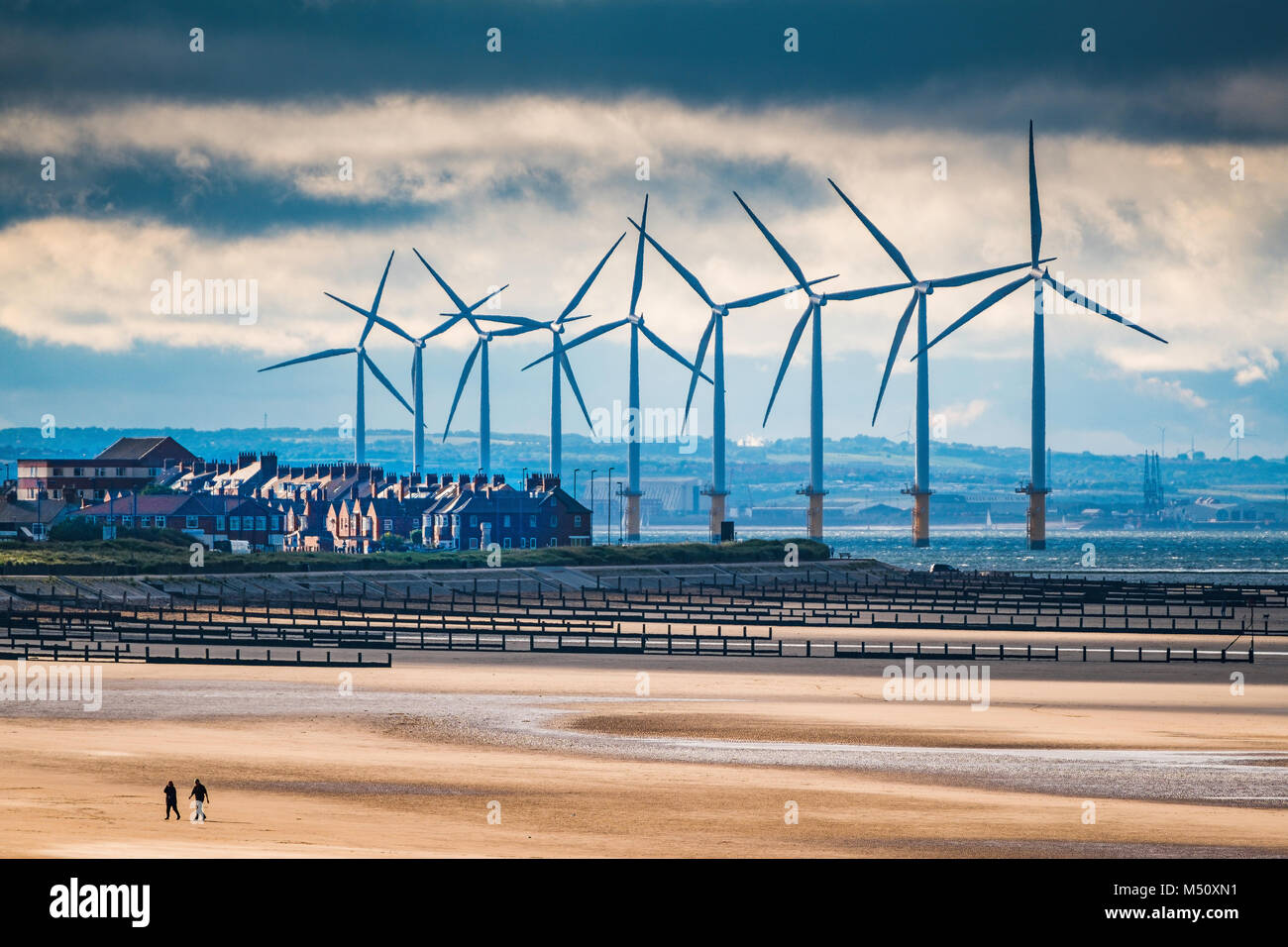 Teesside Wind Farm also known as Redcar Wind Farm towers over the town of Redcar. Stock Photo