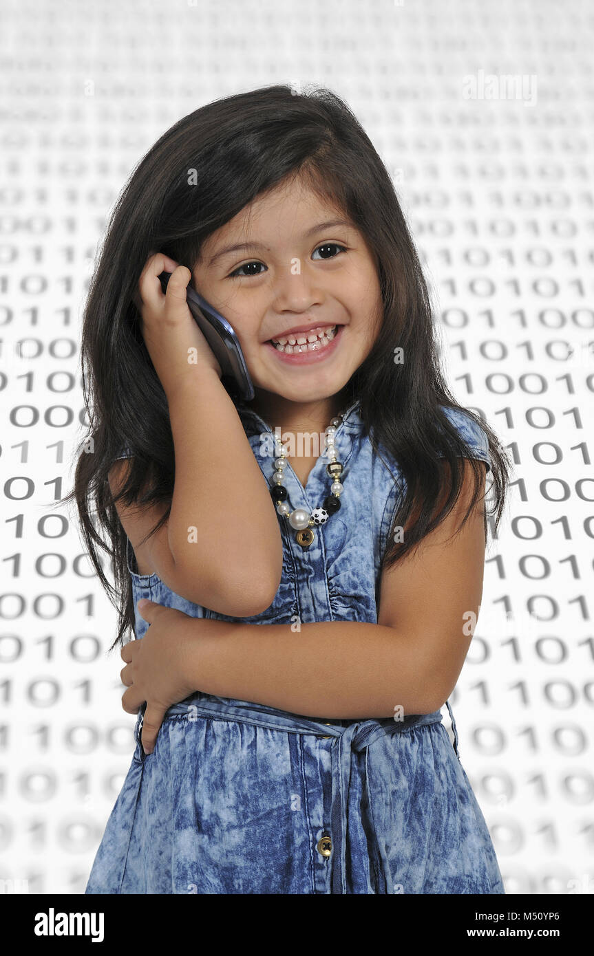 Little Girl Using Cell Phones Stock Photo