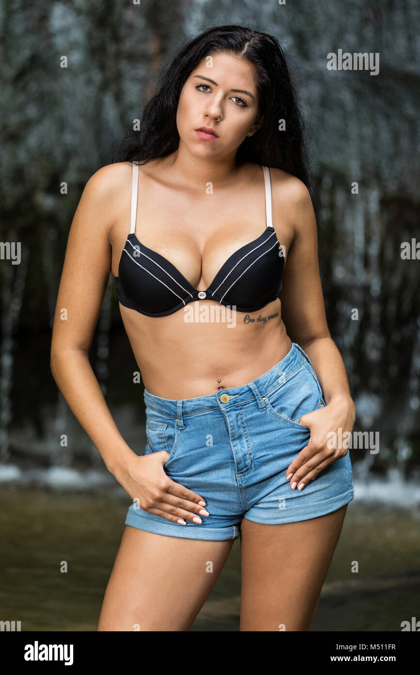 Young woman in bra and hotpants Stock Photo