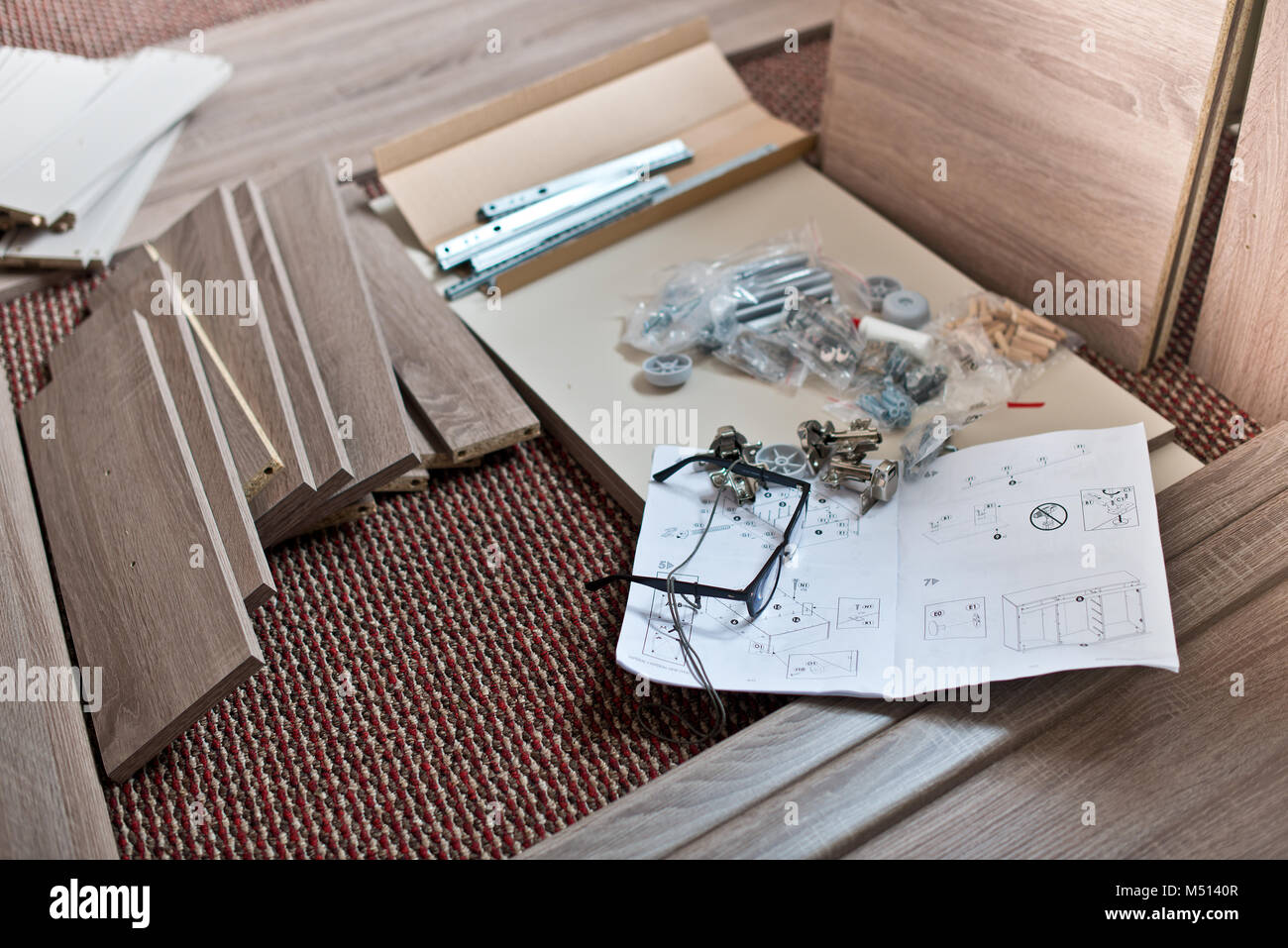 Preparation for New Furniture Installation on the Carpet. Stock Photo