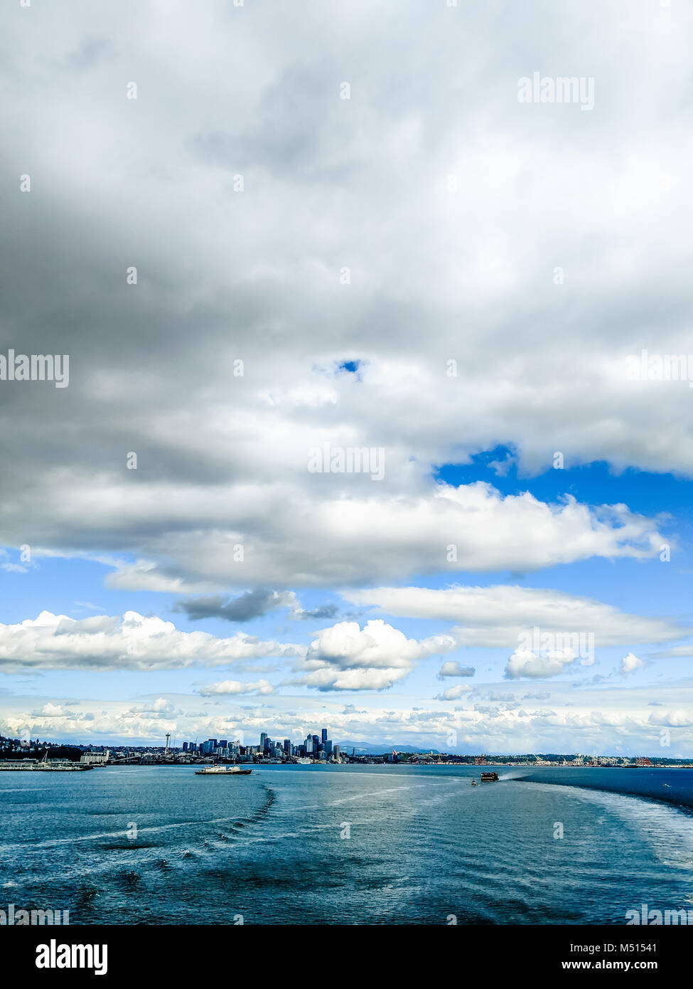 SEATTLE WASHINGTON CITYSCAPE SKYLINE ON PARTLY CLOUDY DAY Stock Photo