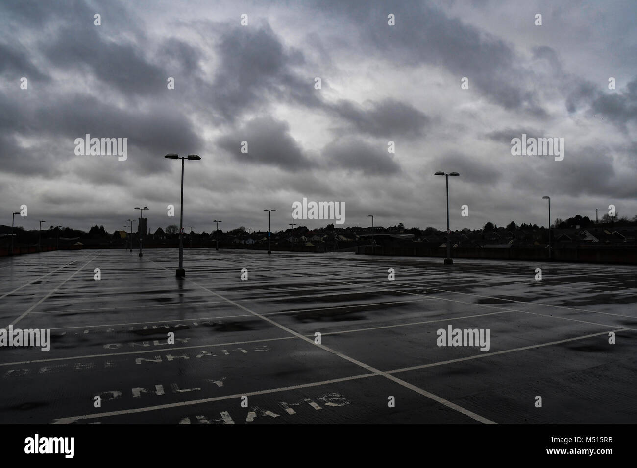 TOP OF MULTY STORY CAR PARK CARMATHEN TWON CEMTAT ON A WET OVERCAST DAY Stock Photo