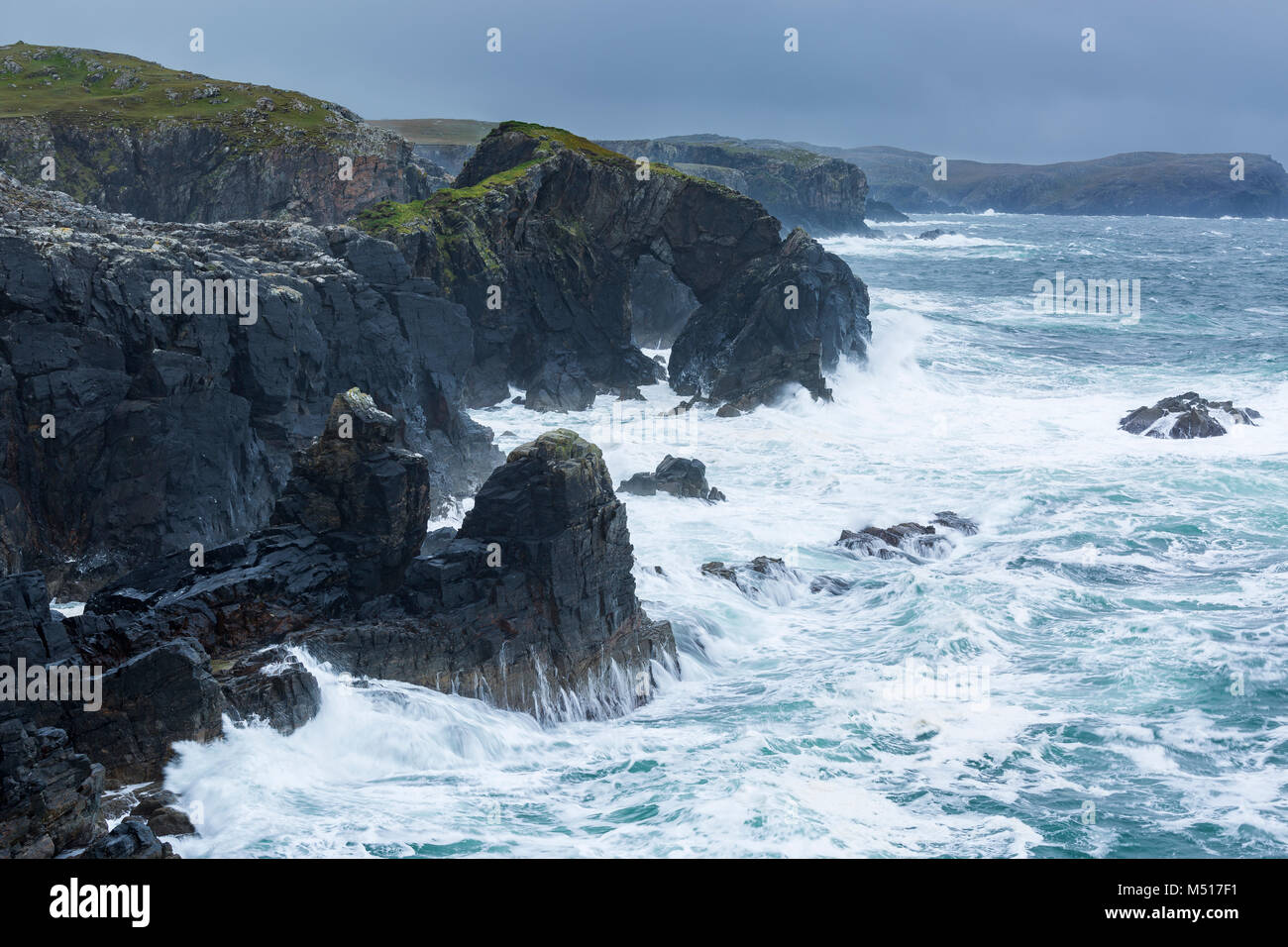 The Stac a' Phris natural arch on a stormy day. Near Shawbost, Isle of Lewis, Outer Hebrides, Scotland, UK Stock Photo