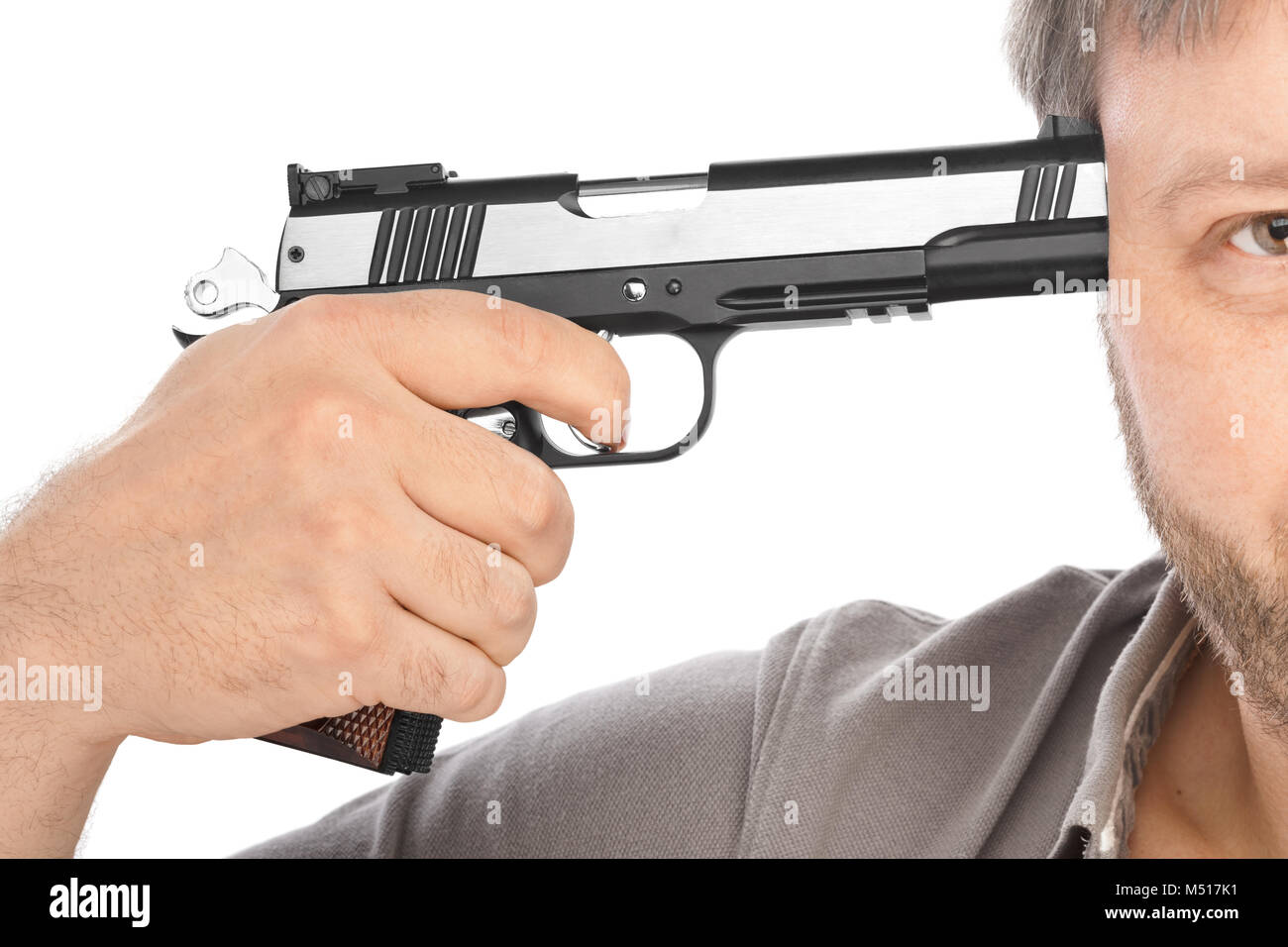 Man tries to shoot himself Stock Photo