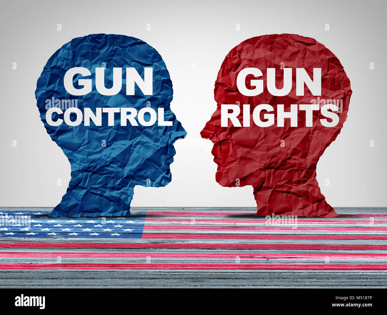 Gun debate as the right to control firearms laws versus the constitutional rights of owners of guns as a political American argument concept. Stock Photo