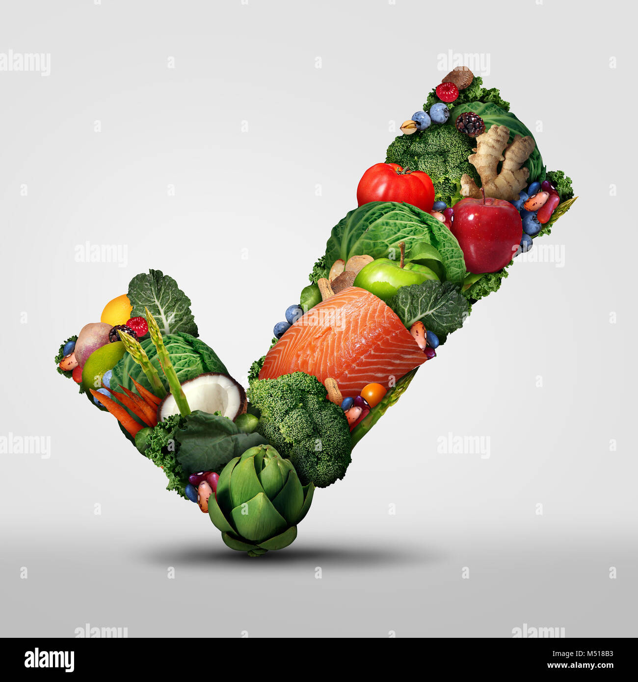 Approved healthy food and a symbol for raw organic fresh food as a check mark shaped with vegetables fruit nuts fish and beans as a dietary icon. Stock Photo