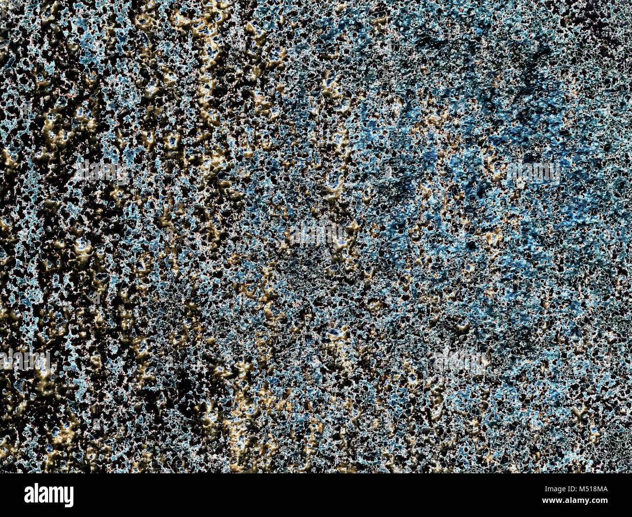Background with blue and black paint flaking off a wall Stock Photo