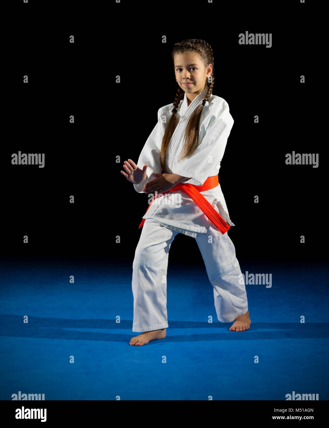 Little girl martial arts fighter isolated Stock Photo Alamy