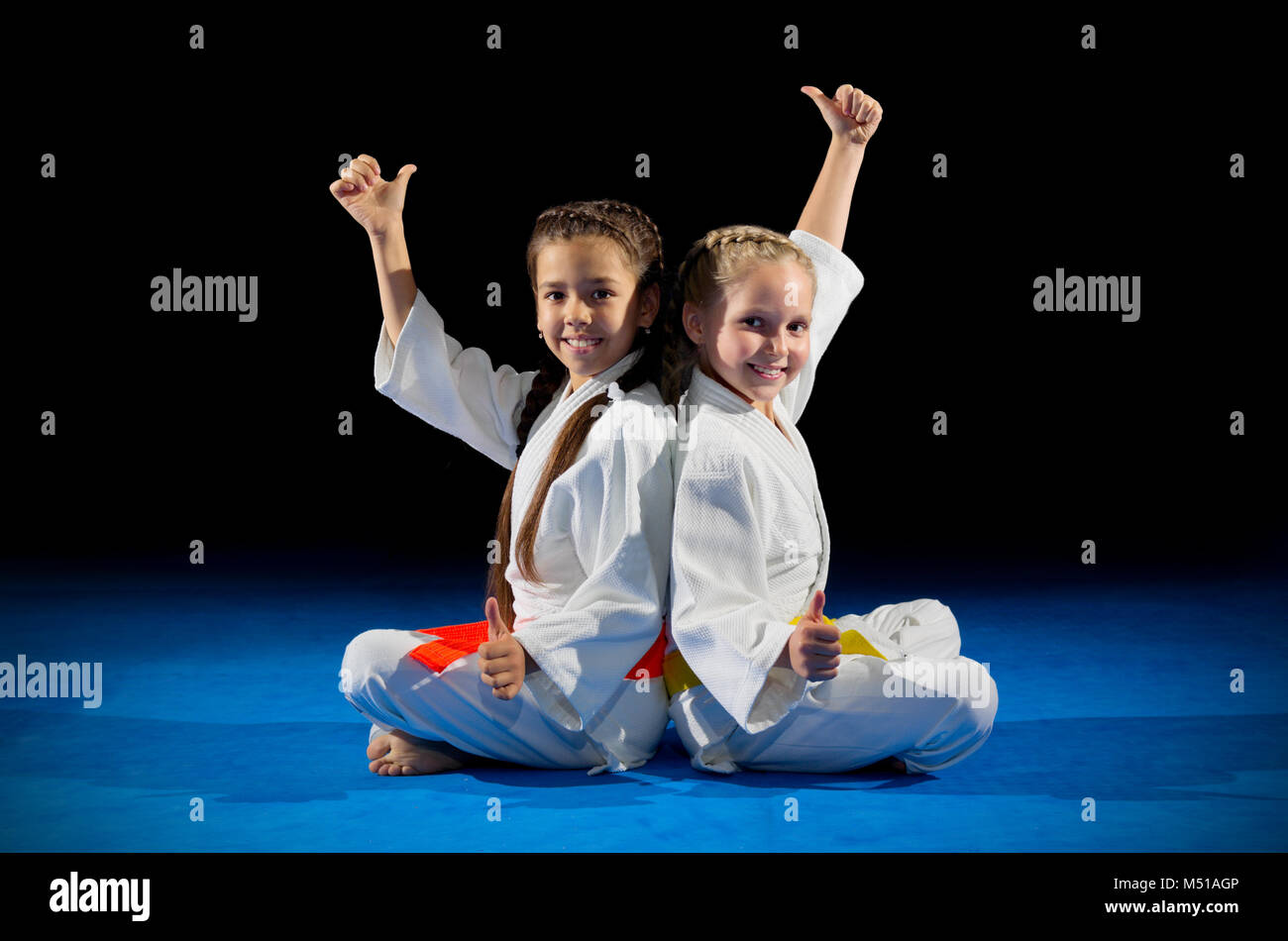 Little girls martial arts fighters isolated Stock Photo Alamy