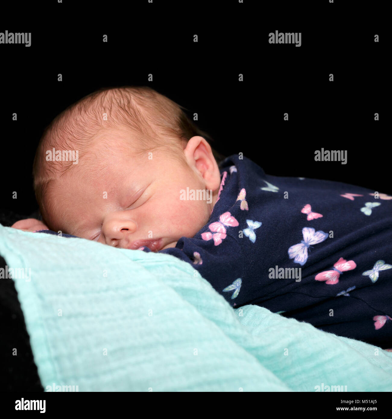 Black baby sleeping on bed hi-res stock photography and images - Alamy