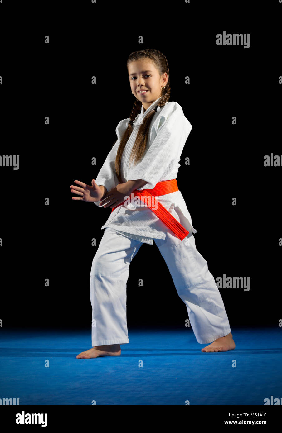 Little girl martial arts fighter isolated Stock Photo Alamy