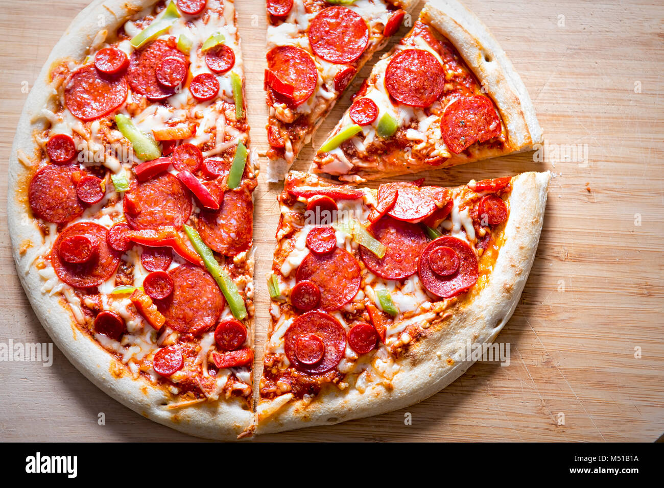 Double pepperoni & green pepper pizza Stock Photo Alamy