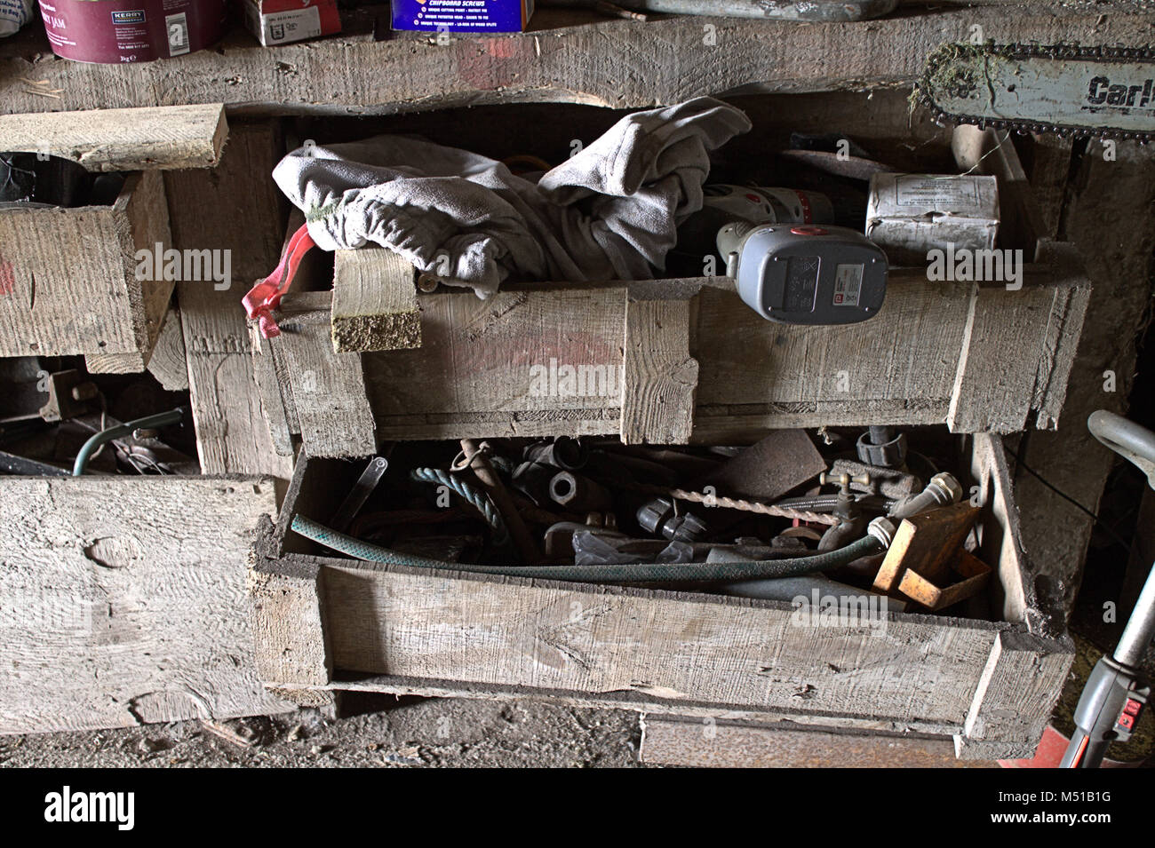 Old tool chest pulled open full of junk. Stock Photo
