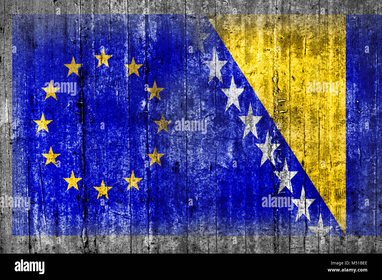 EU and Bosnia and Herzegovina flag on concrete wall Stock Photo