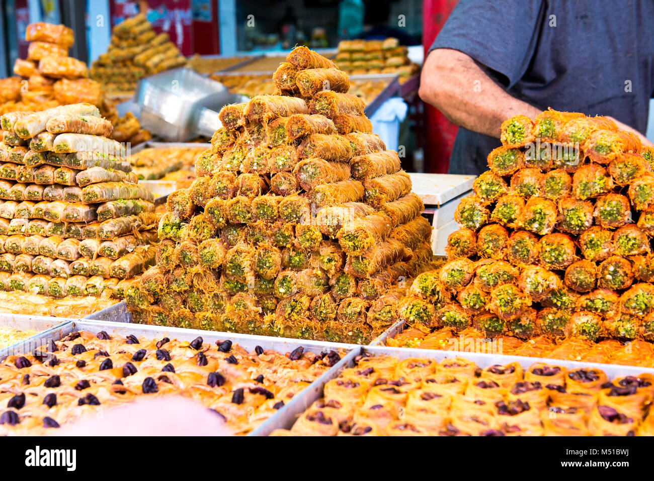 Variety of sweets on the arab street market stall. Eastern sweets in a