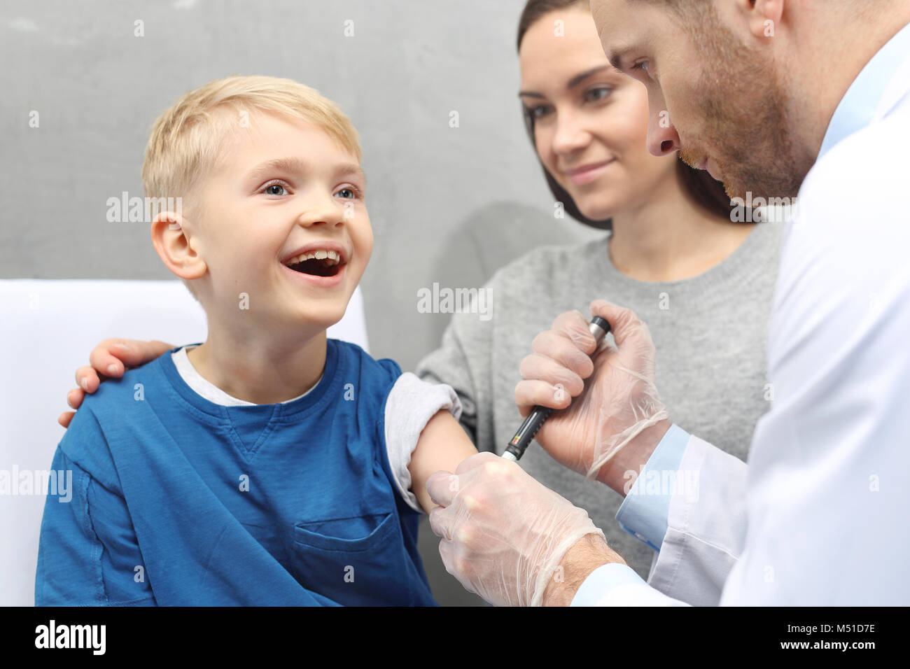 Diabetes in children. A child with diabetes when injecting insulin Stock Photo