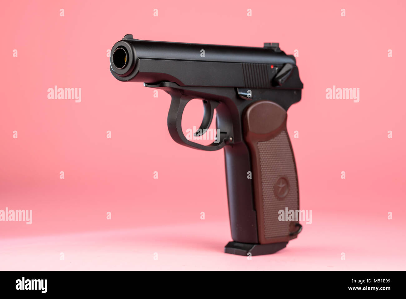 Gun isolated on white background Stock Photo - Alamy