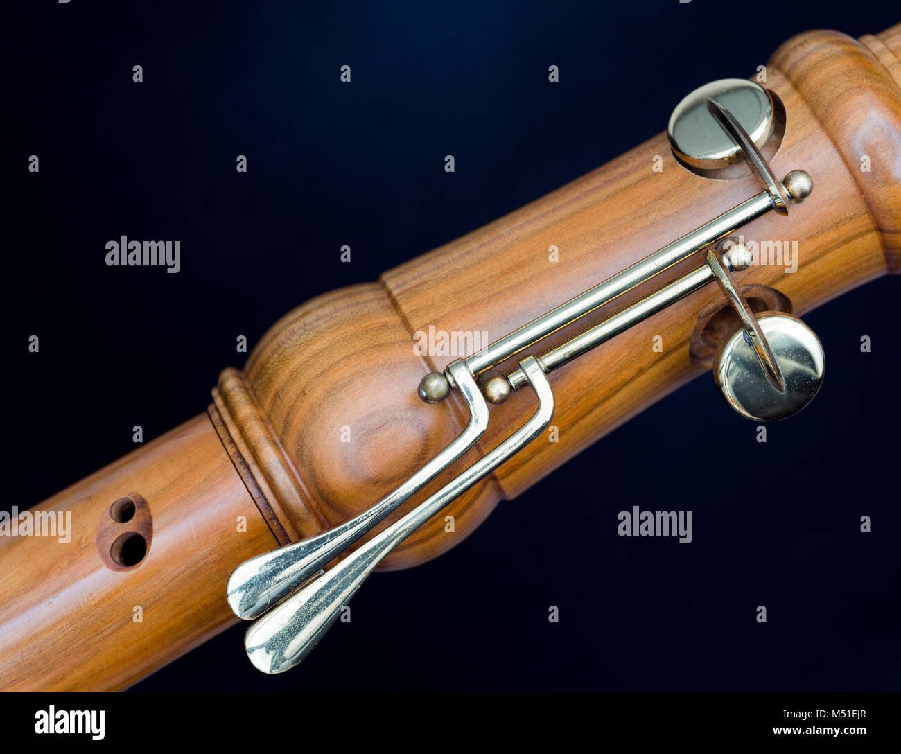 part of bass recorder against dark background Stock Photo Alamy
