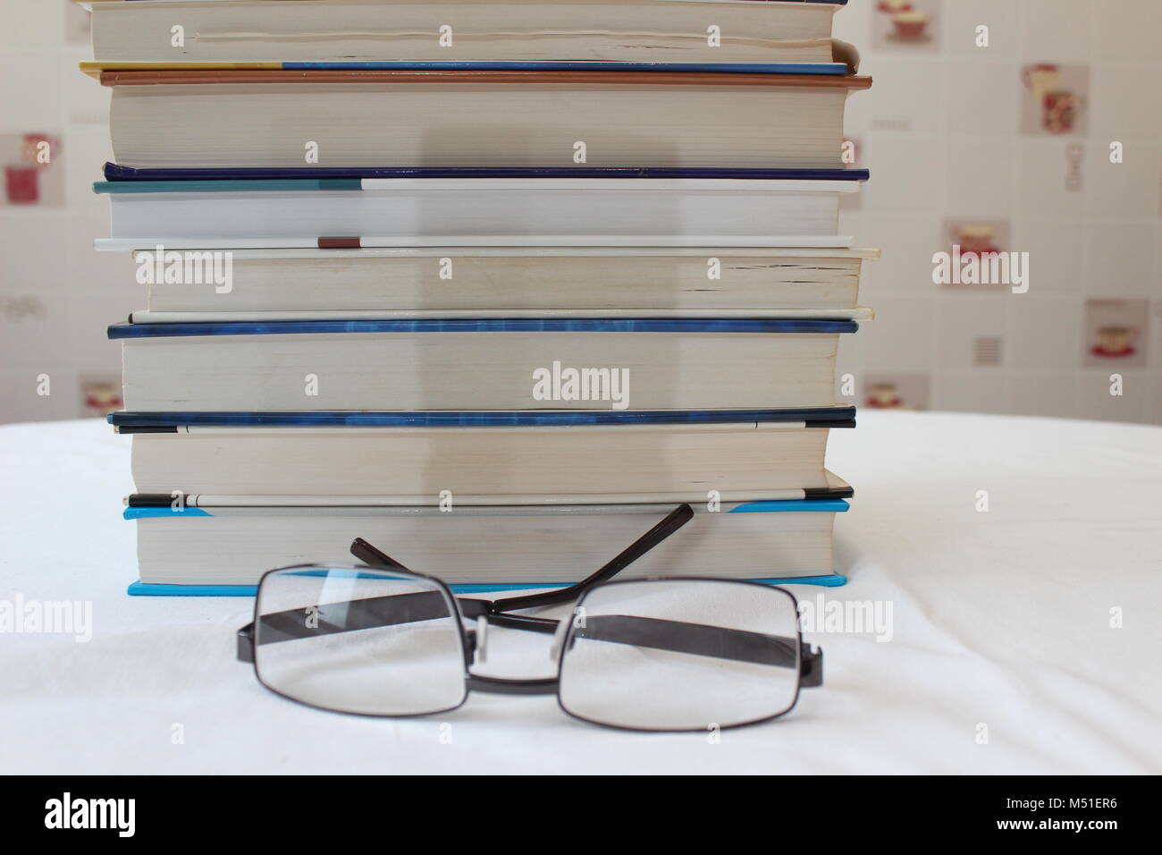 Stacked collection of books Stock Photo - Alamy