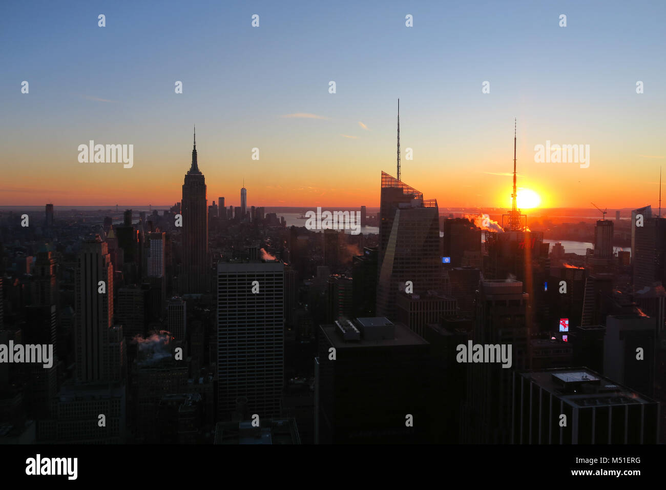 New York City Skyline in Sunset Stock Photo - Alamy