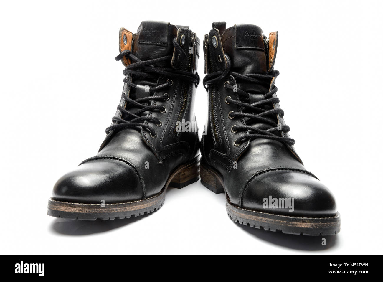 One pair of black leather boots isolated on white background Stock Photo -  Alamy
