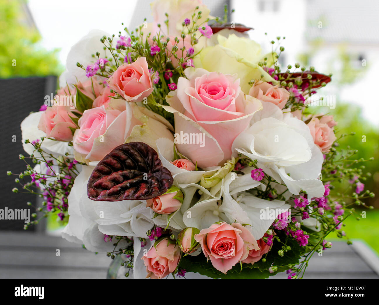 Bridal bouquet beautiful flowers like roses, gypsophila and violets Stock  Photo - Alamy