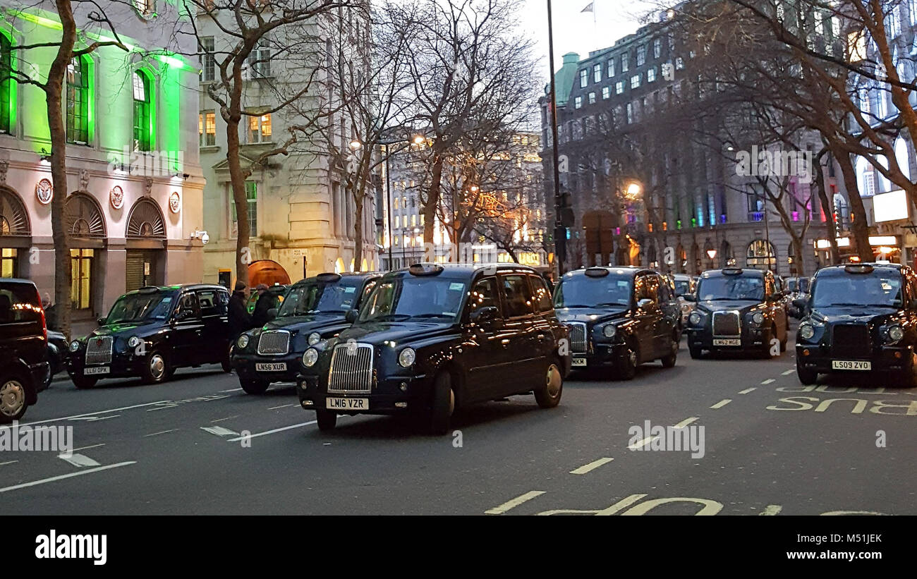 Black cab drivers protest in Holborn during rush hour against minicab firm Uber's continued operation in London. Transport for London (TfL) revoked Uber's license in September 2017 and the decision is currently under appeal.  Featuring: Atmosphere Where: London, United Kingdom When: 19 Jan 2018 Credit: WENN.com Stock Photo