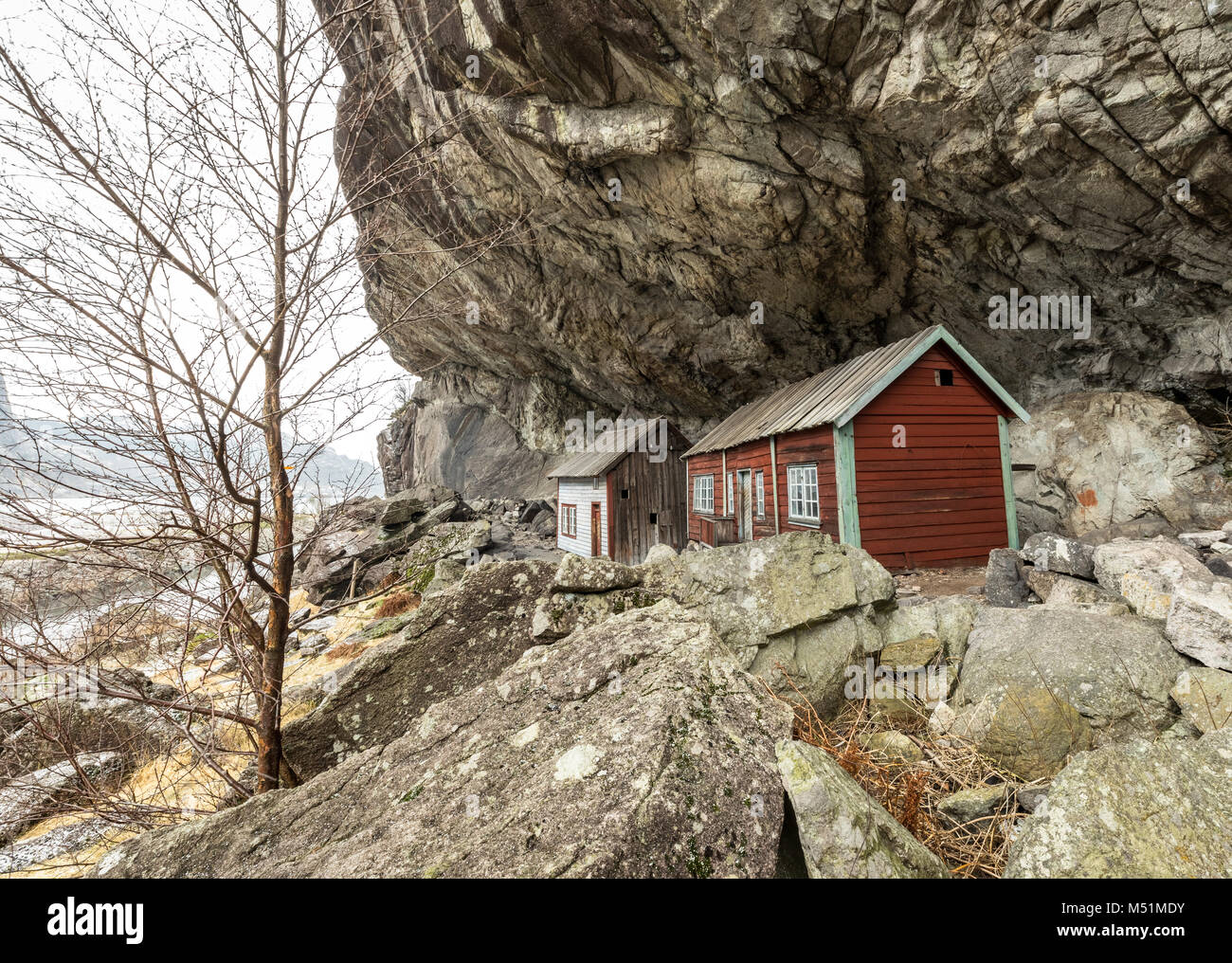 The Helleren houses in Jossingfjord along road 44 between Egersund and Flekkefjord, Sokndal municipality, Norway. January Stock Photo