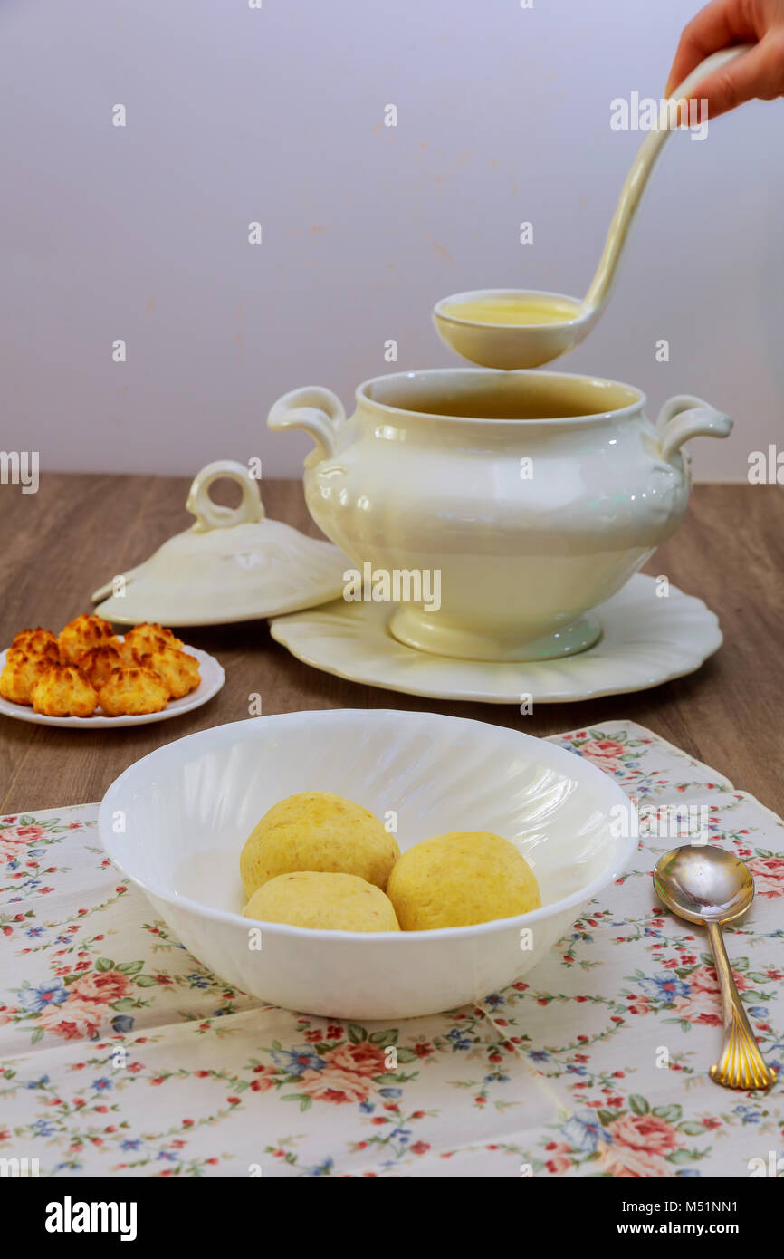 Hands of a woman prepares Matzah balls, Ashkenazi Jewish soup dumpling