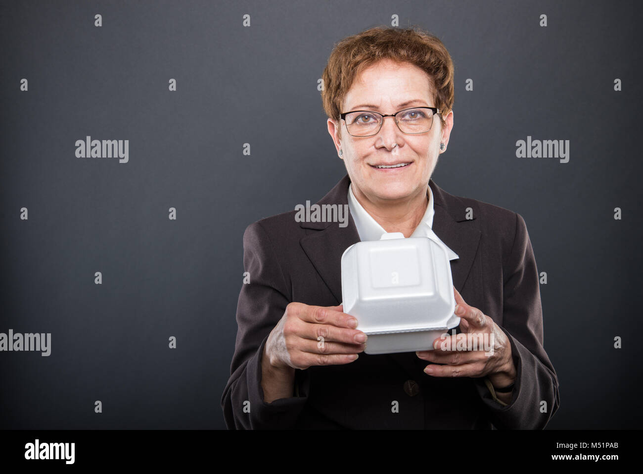 Lady holding lunch box hires stock photography and images Alamy