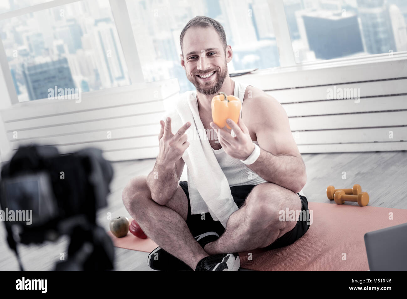 Happy male blogger advising nutrition Stock Photo