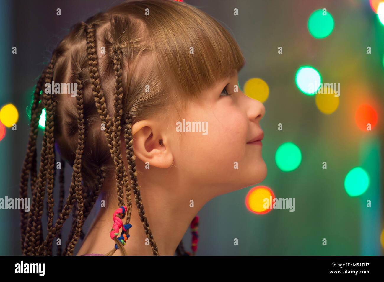 Portrait of pretty little girl with hair braids Stock Photo - Alamy