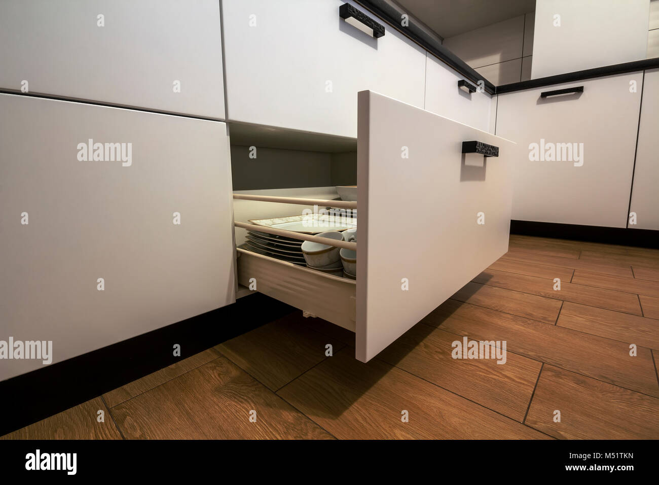Open Kitchen Drawer With Plates Inside A Smart Solution For
