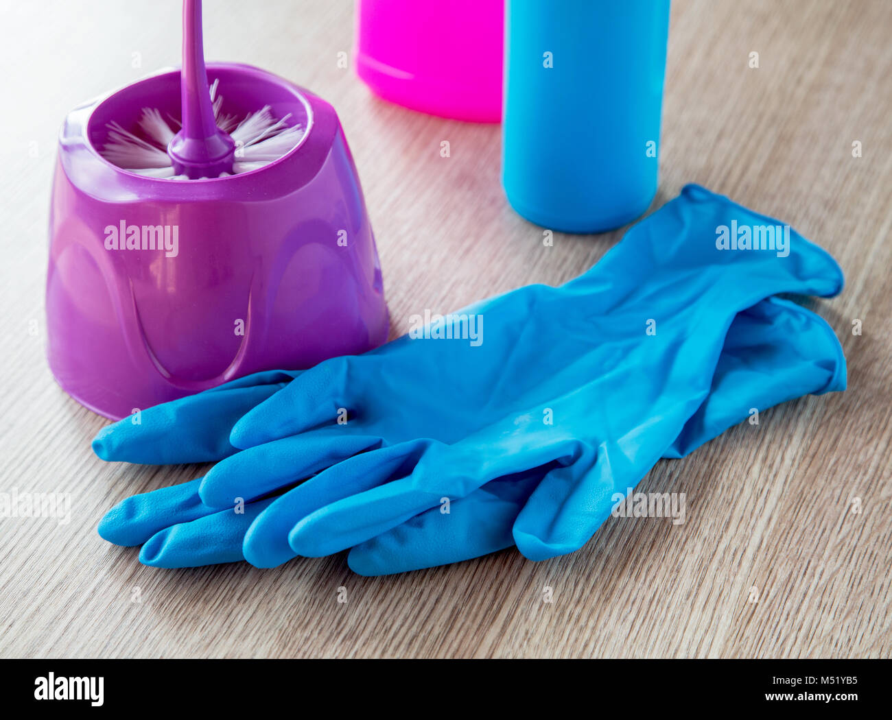 still life with a toilet brush and latex gloves Stock Photo Alamy