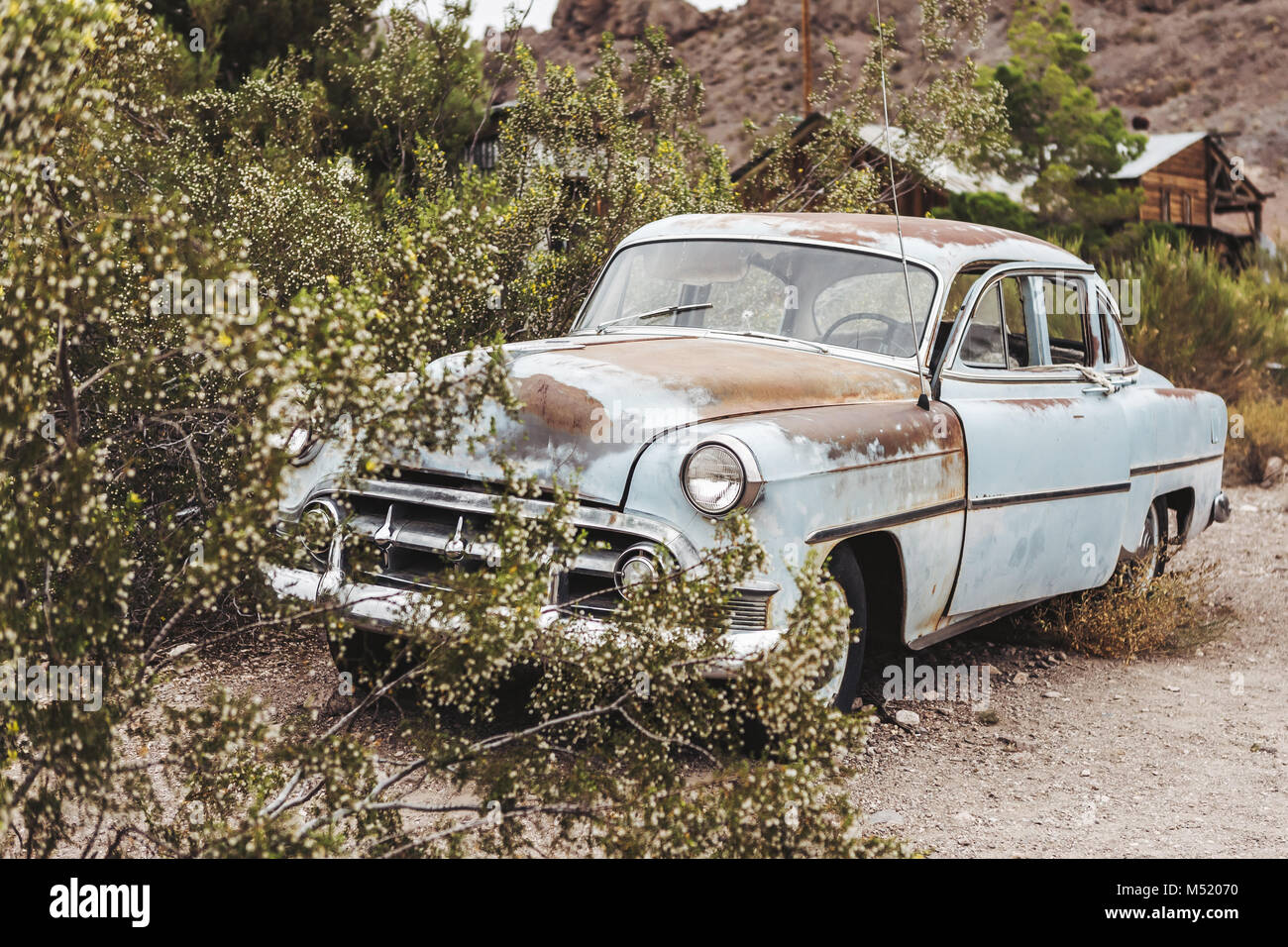 Old vintage rusty car truck abandoned in the desert Stock Photo - Alamy