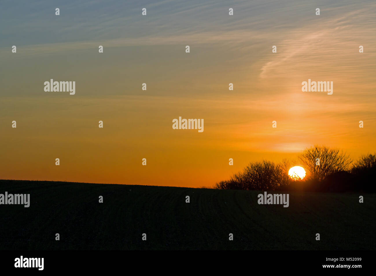 Sunset, Sun Pillar and Copy Space Stock Photo