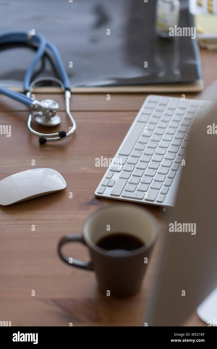 At doctor office. Computer on desk Stock Photo Alamy