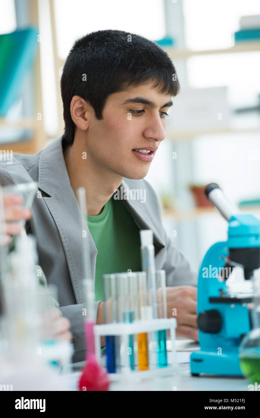 High School Students Handsome Mixed Race Guy Working At Laboratory 