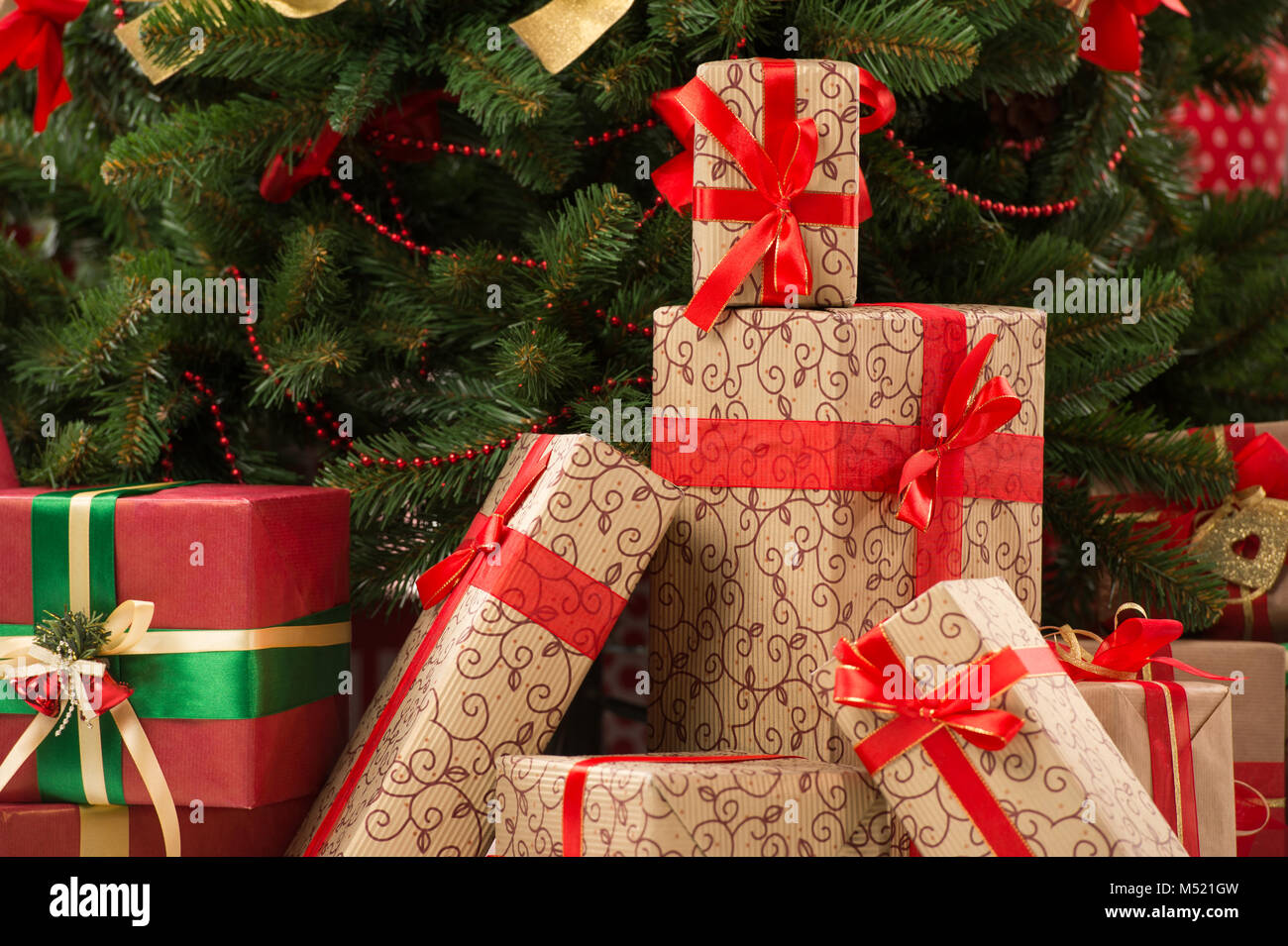 Stack of gift boxes under Christmas tree Stock Photo Alamy