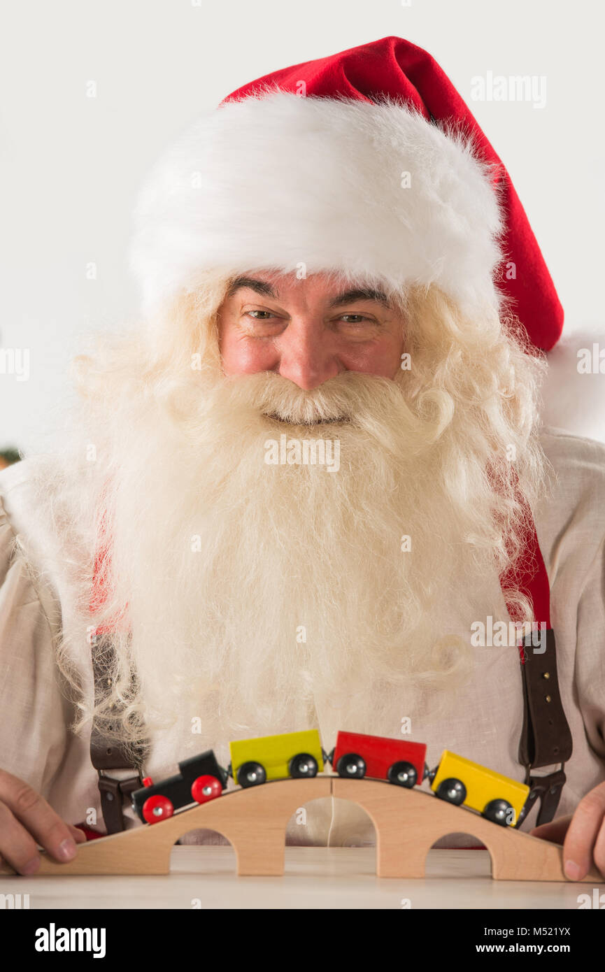 Santa claus home making toys hi-res stock photography and images - Alamy
