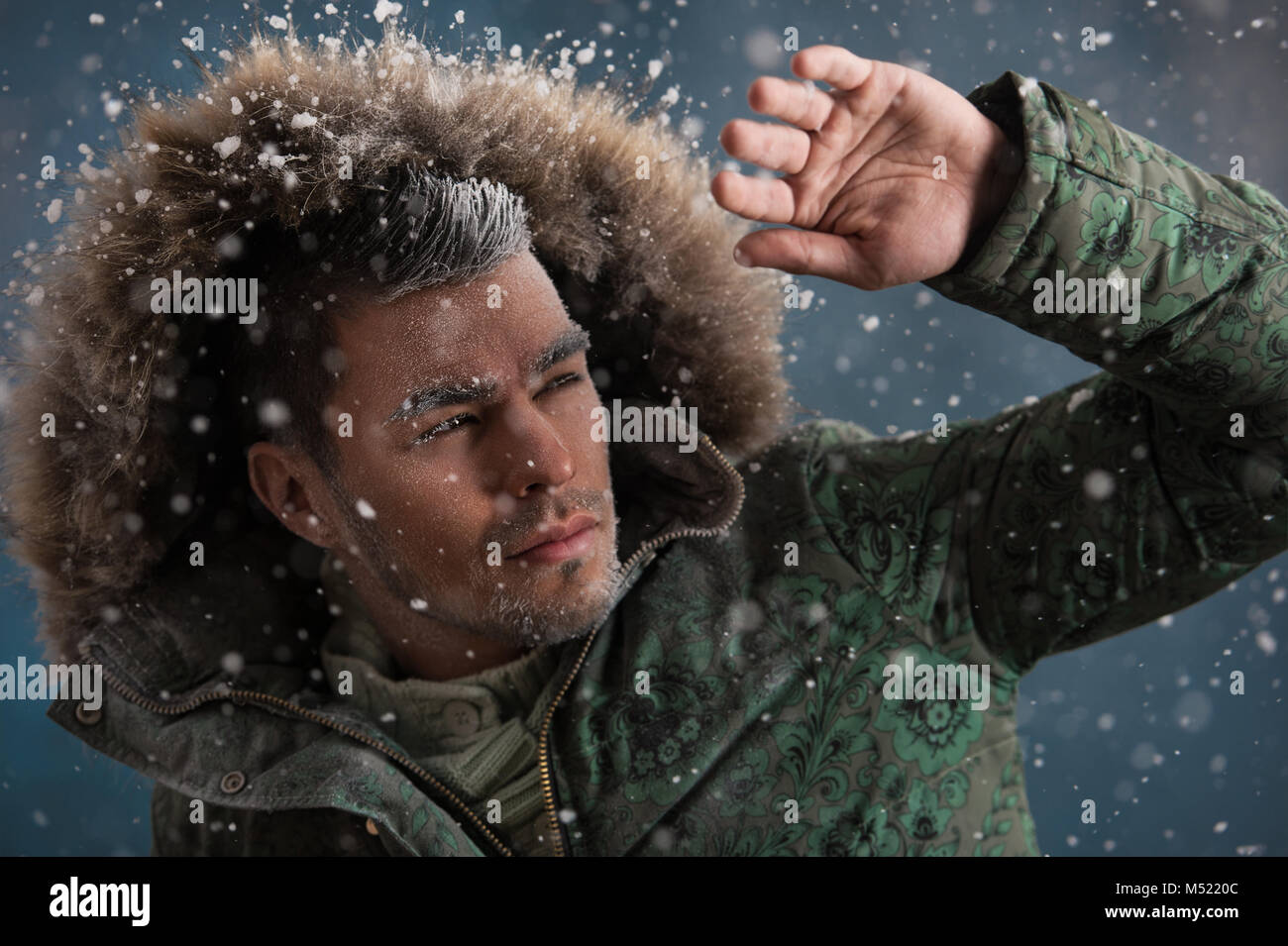 Male posing wearing winter jacket hi-res stock photography and images ...