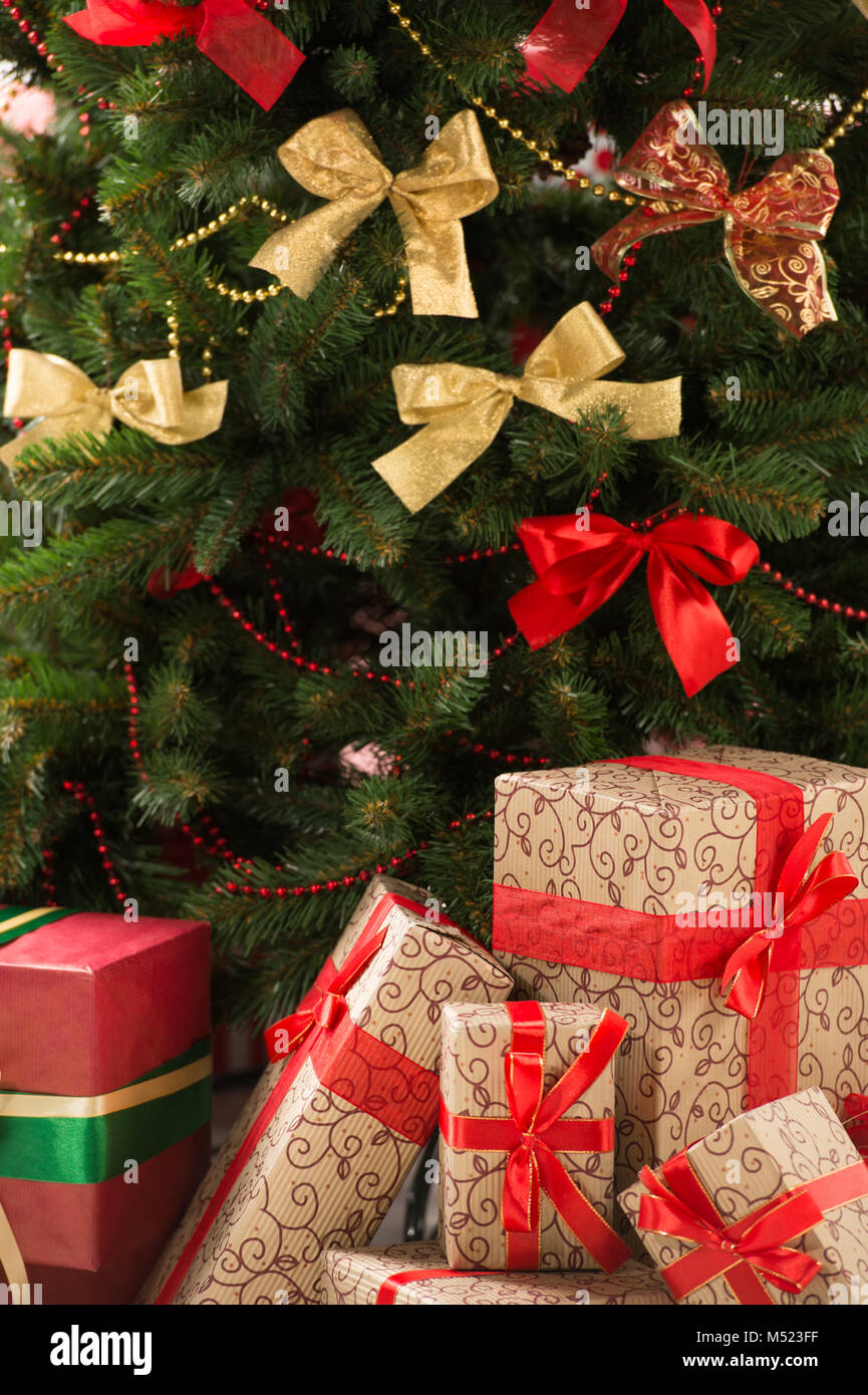 Stack of gift boxes under Christmas tree Stock Photo Alamy