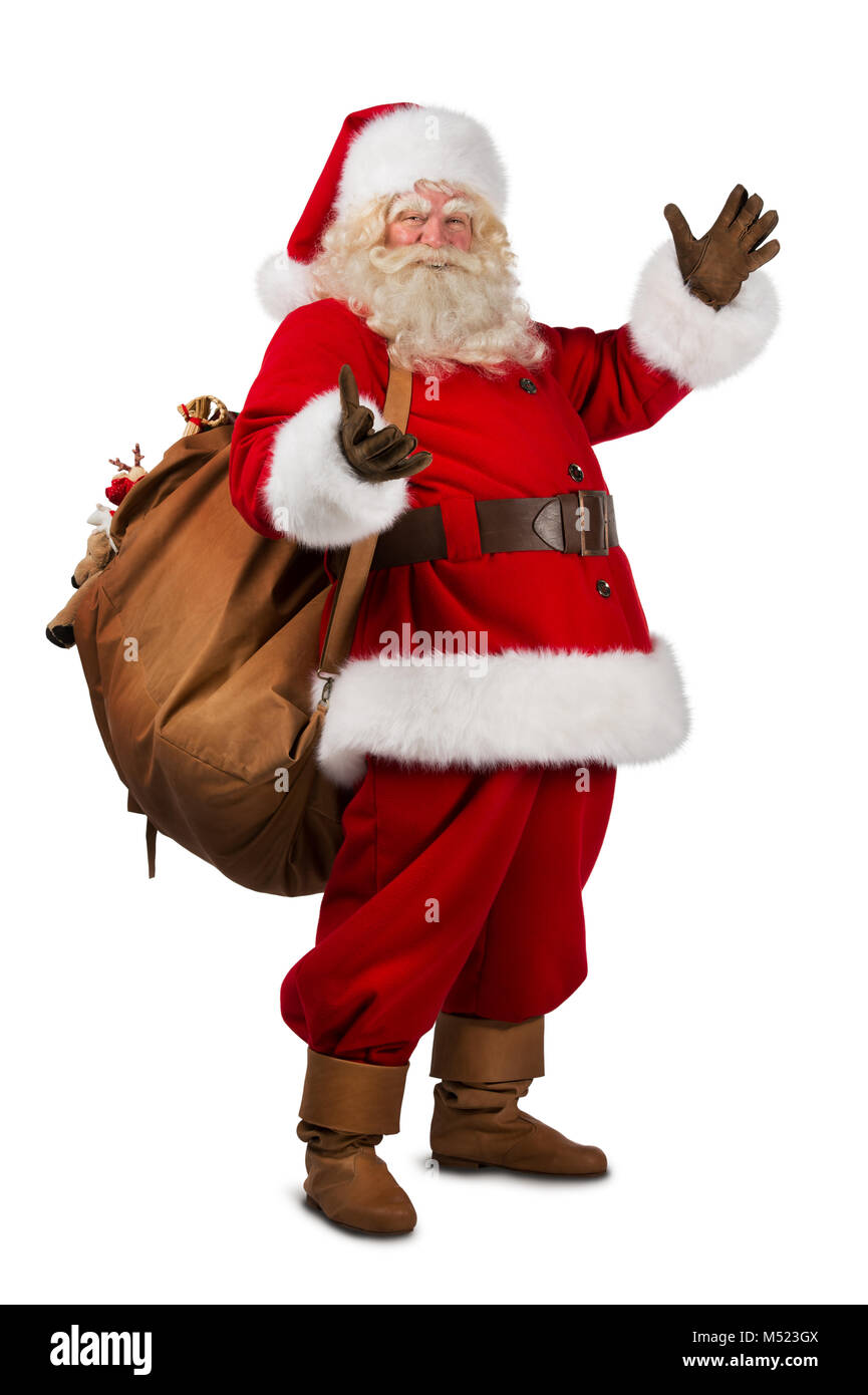Real Santa Claus carrying big bag full of gifts, isolated on white ...