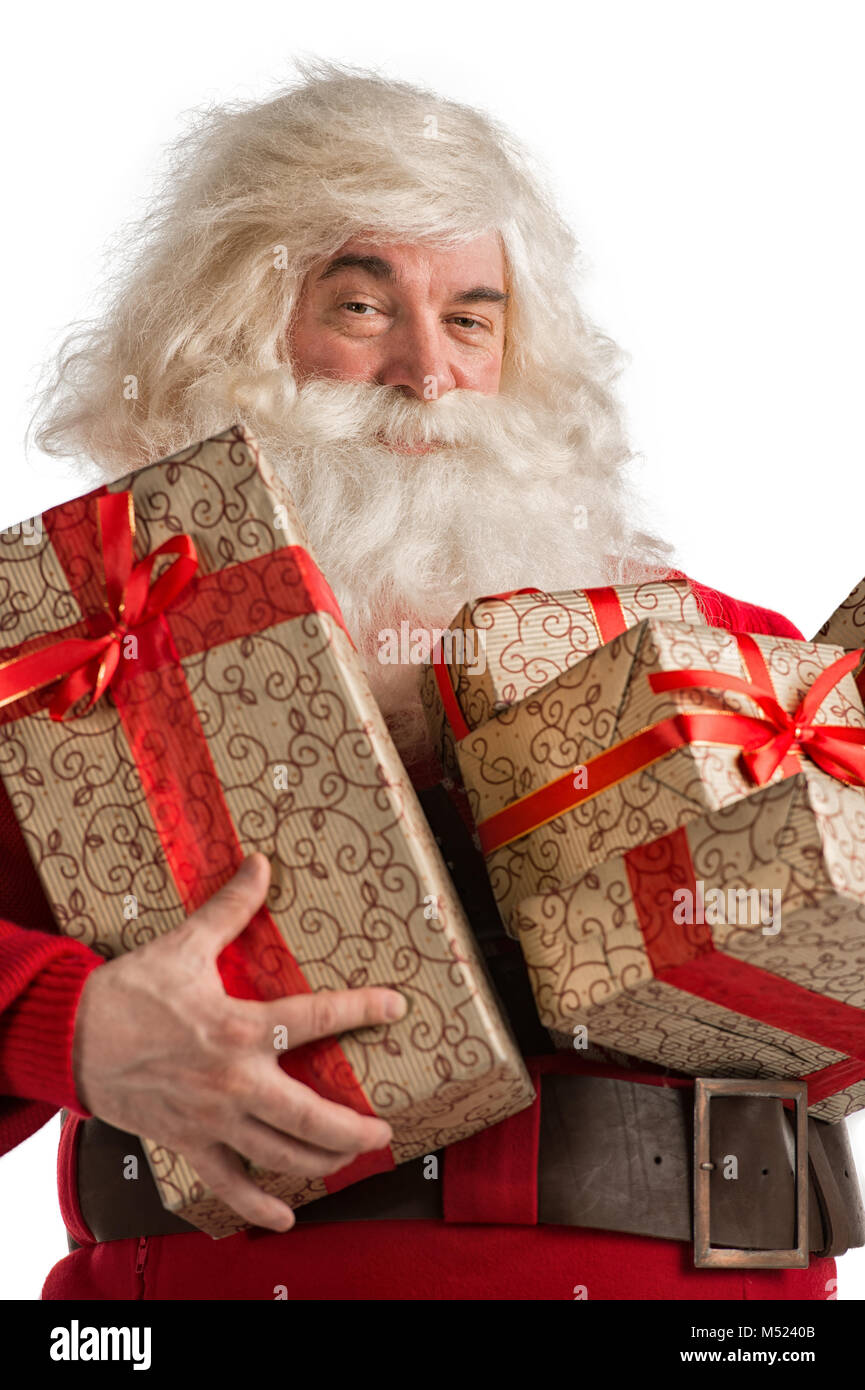 Santa Claus with gift boxes isolated on white background Stock Photo ...