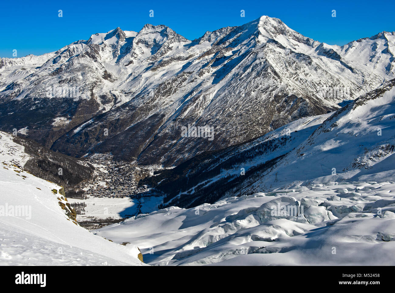 View from the Fee glacier into the valley with winter sports resort Saas-Fee,Valais,Switzerland Stock Photo