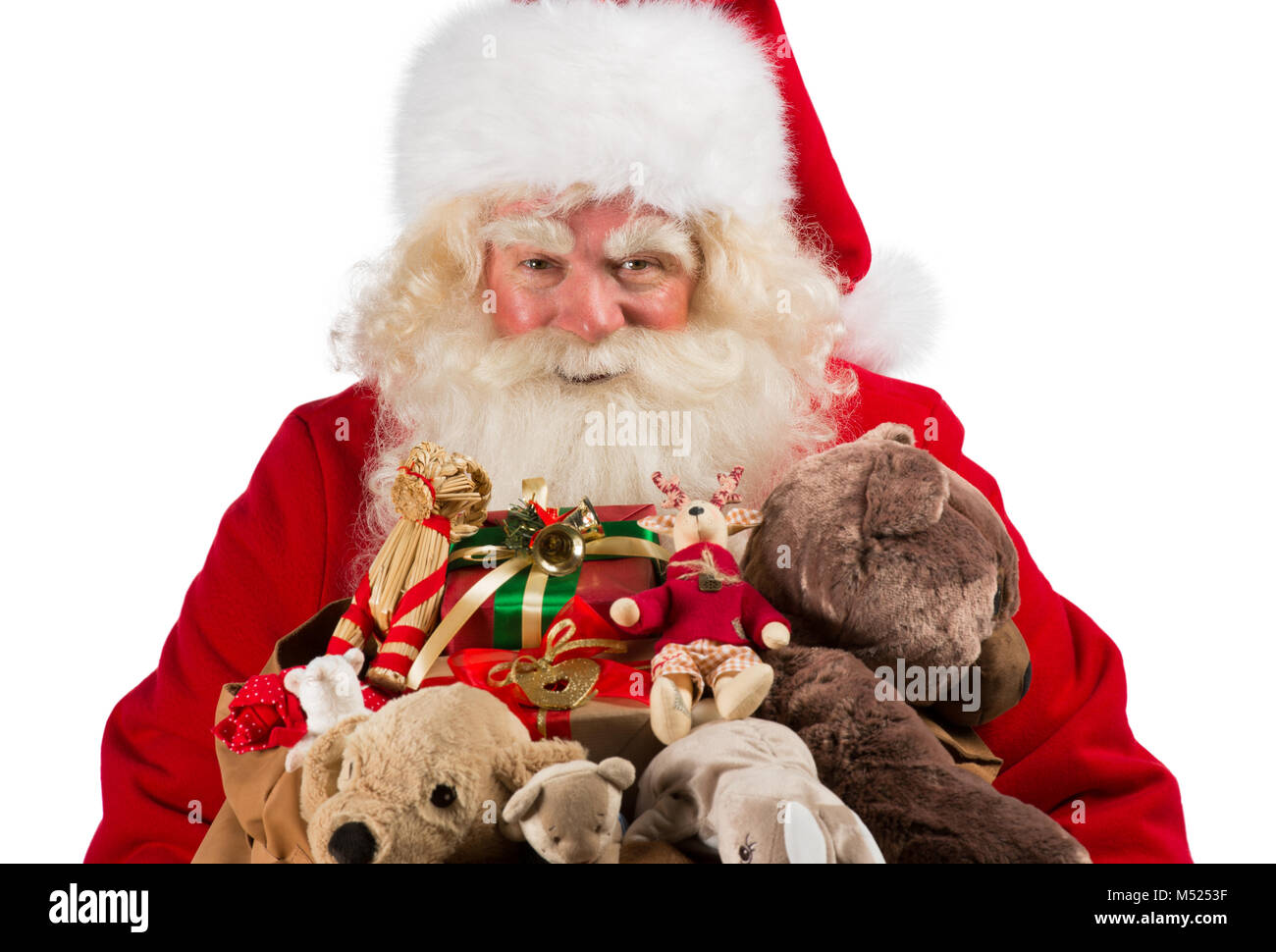 Christmas. Santa Claus is suffering from back pain and holds a red bag with  gifts on his back. Isolated on white background. Stock Photo by ©satyrenko  212373640