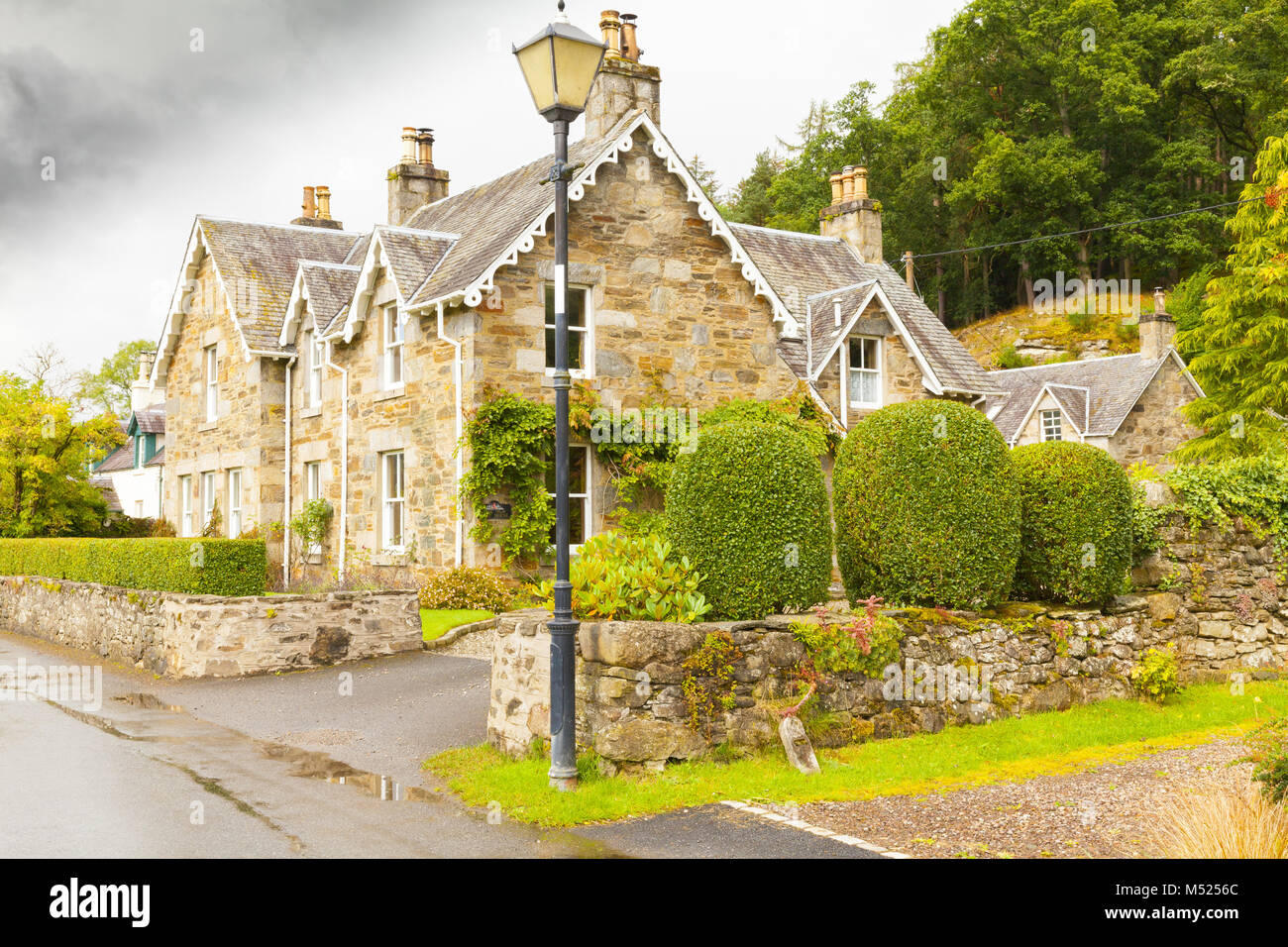 a typical Scottish brick and stone house Fortingall Scotland Stock
