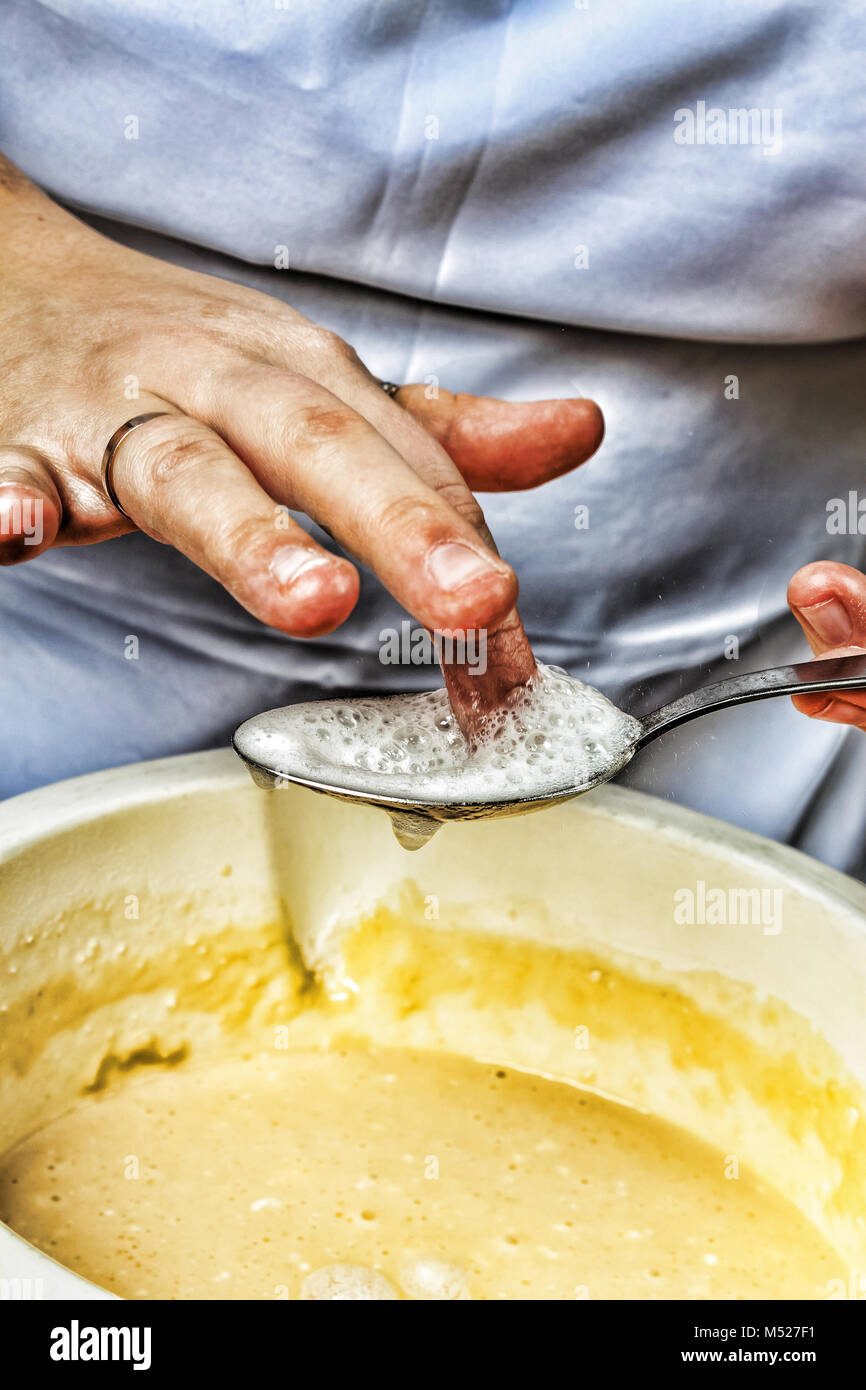 Woman chef mixes ingredients for baking closeup Stock Photo Alamy