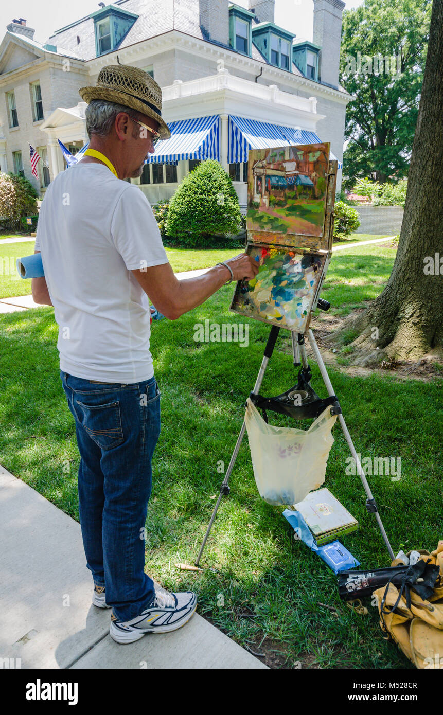 Artist sketching one of the Porter Road houses. Built in 1905, the historical homes of Porter