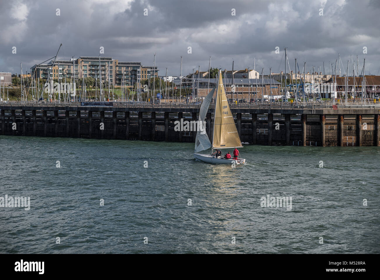 sailing boat passing Queen Anne's Battery marina Stock Photo Alamy